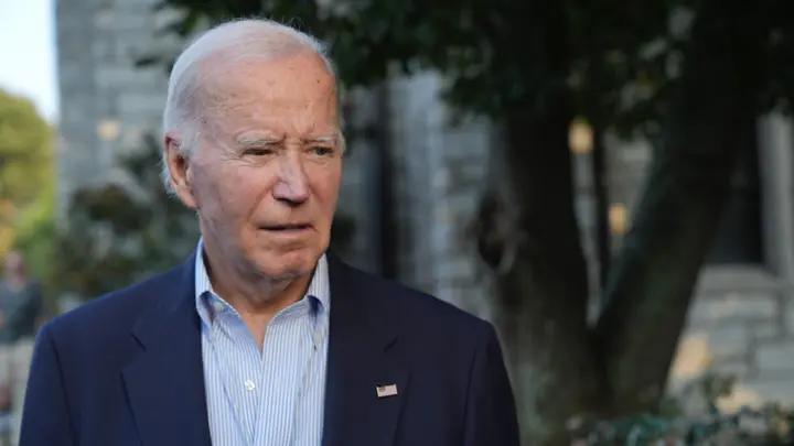 Biden groups up